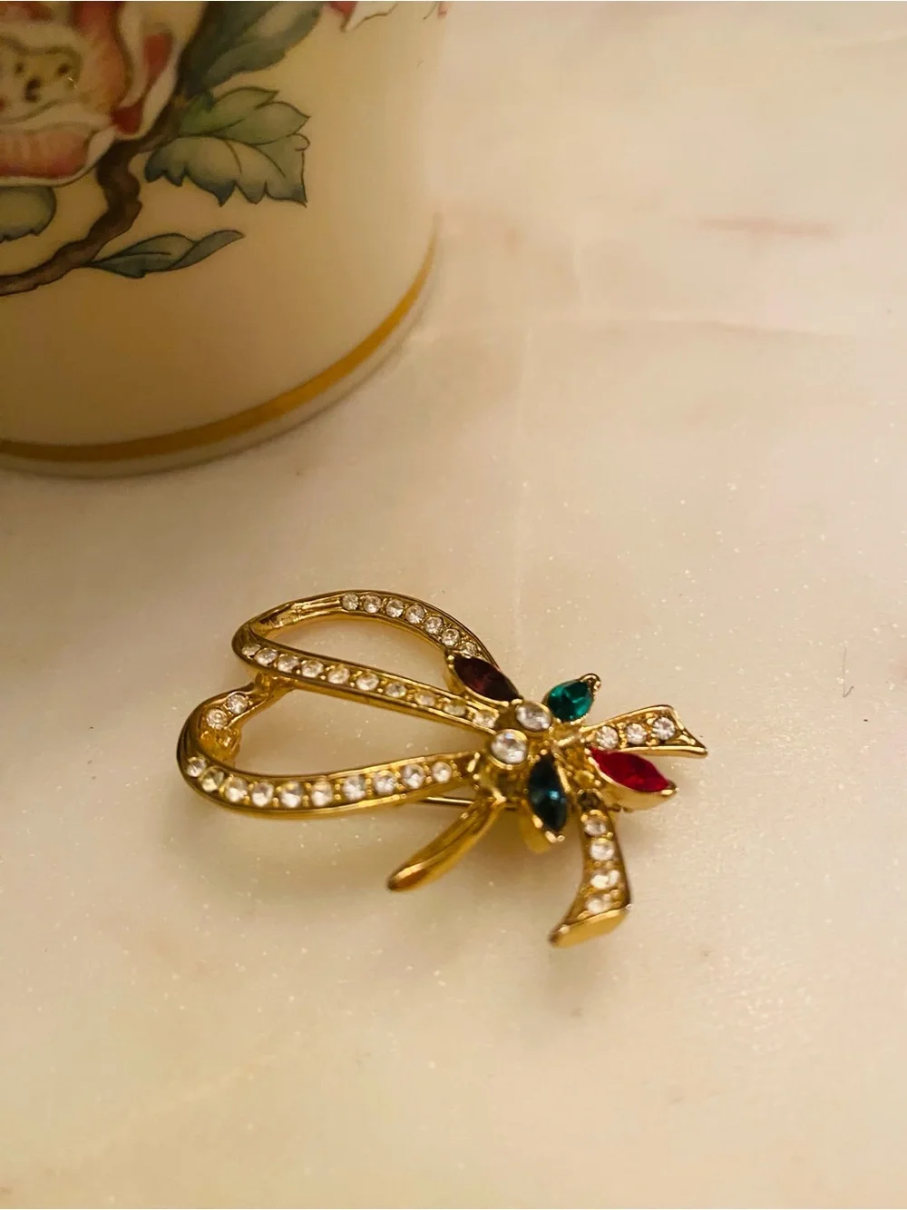 Gold-Tone Crystal Ribbon Brooch with Multi-Colored Gem Accents (Like New)